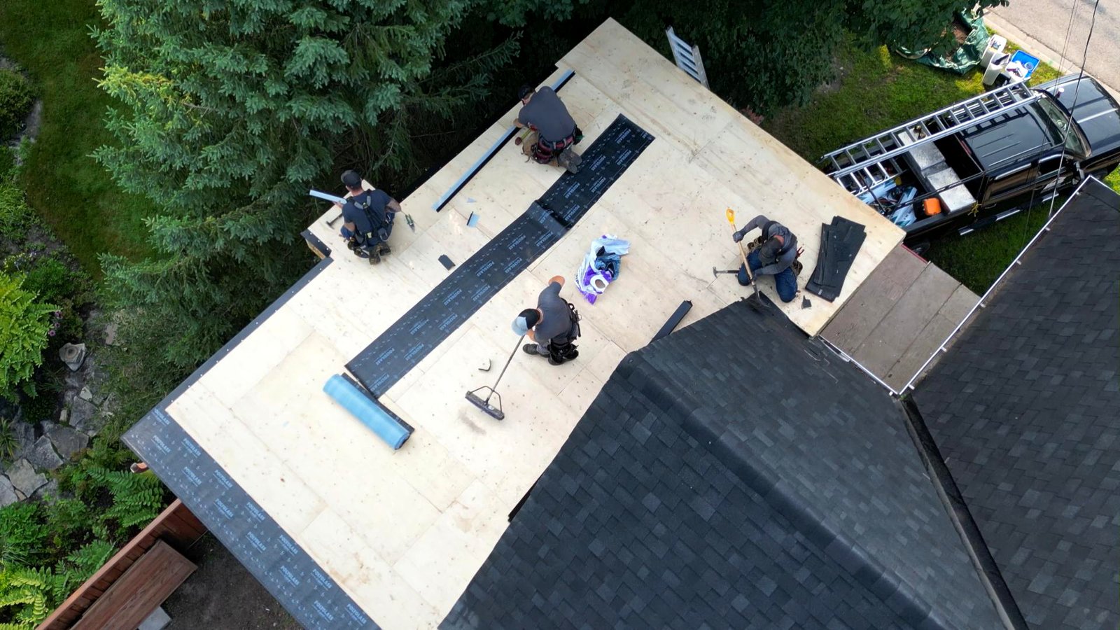 Starting a Residential Flat Roofing Job by McKay Roofing